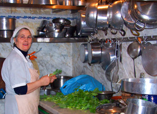 Teresa in the kitchen at Trattoria Settimio Pellegrino