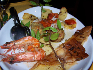 Fish and gamberoni at Ristoro al Vecchio Teatro, Pisa, Italy.