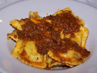 Ravioli with ricotta and spinach in meat sauce at Trattoria Toscana Gozzi Sergio, Firenze, Italy.